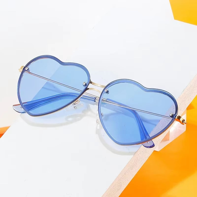 Heart-Shaped Rimless Sunglasses with Clear Ocean Lenses