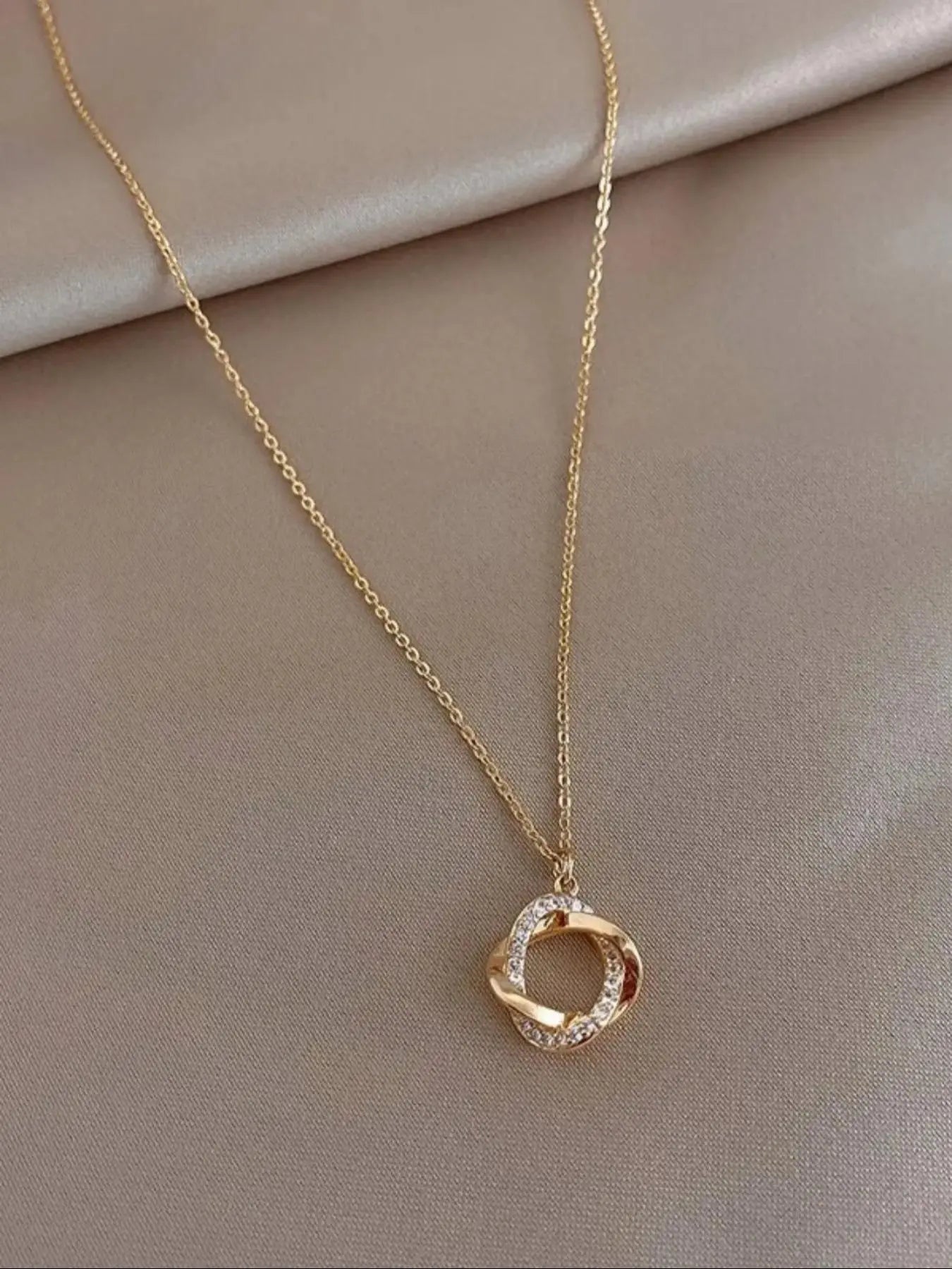 Twisted Circle Pendant Necklace with Rhinestone Accents