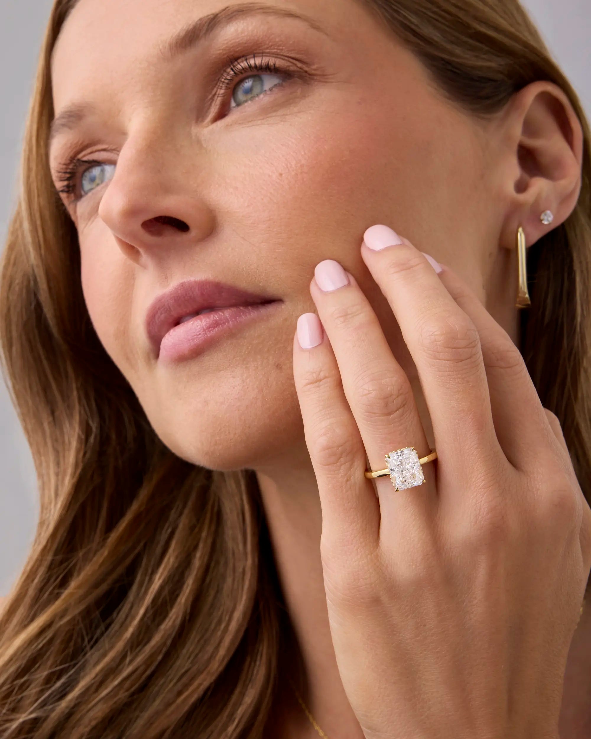 PAVOI 14K Gold Plated 3.5CT Square Radiant Cubic Zirconia Engagement and Promise Ring for Women with Hidden Halo Design