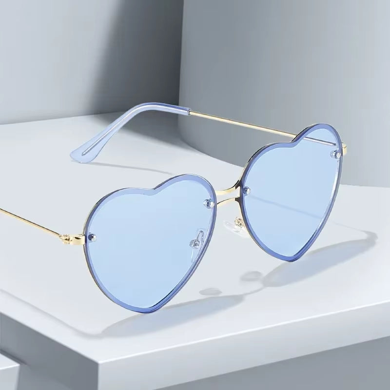 Heart-Shaped Rimless Sunglasses with Clear Ocean Lenses