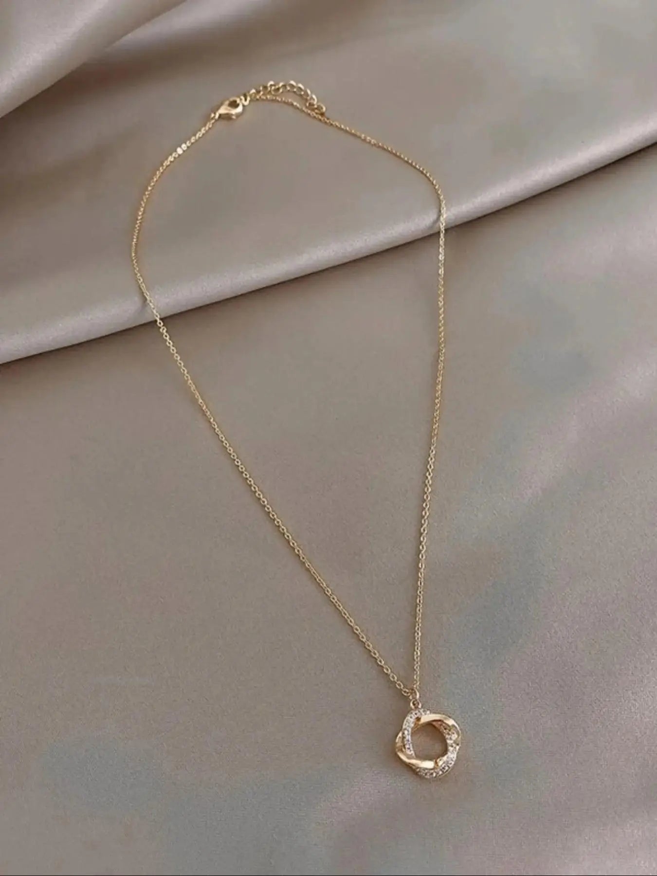 Twisted Circle Pendant Necklace with Rhinestone Accents